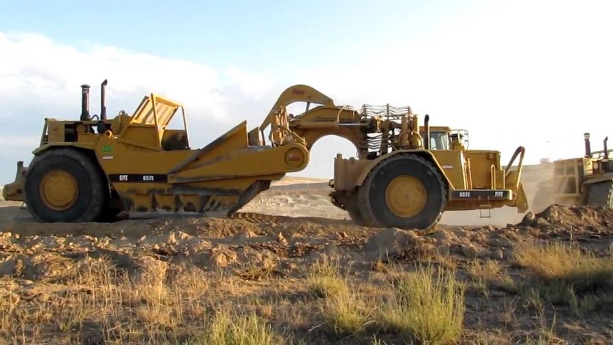 Колесный скрепер Caterpillar 657G